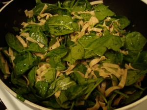 toss pasta and spinach until heated through